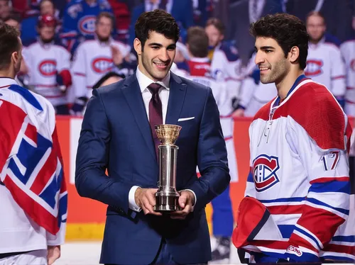 Max Pacioretty accepts the torch symbolic of being named captain of the Montreal Canadiens. He's the third American-born player so honored.,the cup,the hand with the cup,jáchymov,award ceremony,trophy