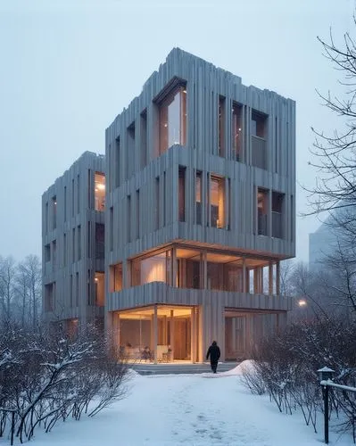  ,a person walks near snow covered buildings in the night,cubic house,snohetta,cube house,zumthor,winter house,snow house