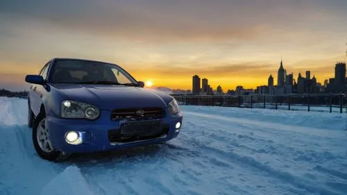 Sunset in the city in winter,a small blue car driving down a road,uaz,avtovaz,countryman,fiat nuova 500,bluetec,ssangyong