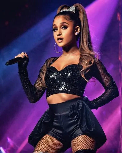 Ariana Grande, idol, solo, (20yo), beautiful detailed eyes, bold eyeliner, high ponytail, curls, glamorous makeup, microphone, sparkly stage outfit, long sleeve crop top, high-waisted shorts, fishnet 