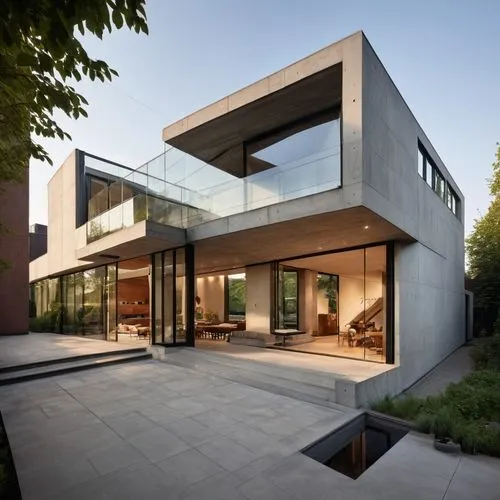 Create a stunning contemporary house. The design should feature clean, minimalist lines with large floor-to-ceiling windows that allow for ample natural light. The exterior should be a blend of glass,