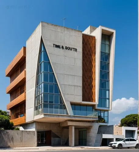 there is a car parked in front of the building,ikeja,ufrj,iita,jntu,bocconi,inova,Photography,General,Realistic