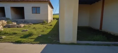 there is a big building near the grass,viminacium,xeriscaping,entrenchments,acequia,termales balneario santa rosa,pachacamac,Photography,General,Realistic