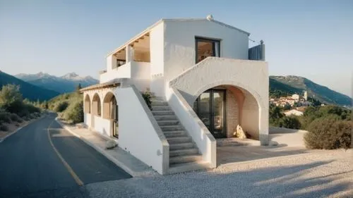 dunes house,cubic house,house in the mountains,house in mountains,stucco frame,house shape,stucco wall,frame house,residential house,private house,holiday villa,inverted cottage,roof landscape,architectural style,exterior decoration,folding roof,stone house,archidaily,clay house,luxury property