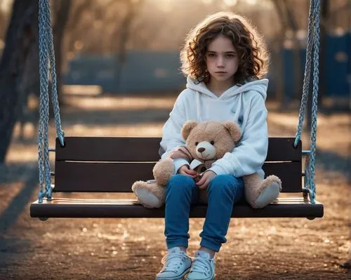 Lonely nine-year-old girl, solo, skinny, pale skin, big brown eyes, messy curly brown hair, freckles on nose, worn-out sneakers, faded blue jeans, oversized white hoodie, holding a small teddy bear, s