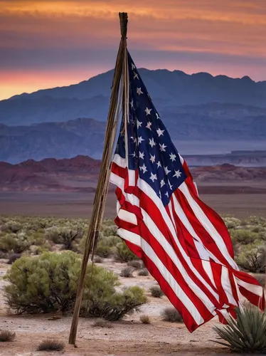 A beautiful and stunning sight of an American flag in a large, dry, barren region, usually having sandy or rocky soil and little or no vegetation.,flag day (usa),flag of the united states,american fla