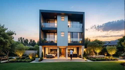 Apartment Modern white colour
,a person stands in the garden near a two story house,townhome,modern house,townhomes,modern architecture,netherwood,tarzana,penthouses,dunes house,contemporary,landscape