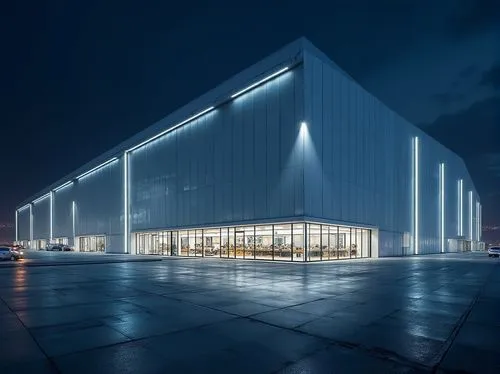 Modern distribution center, innovative façade design, geometric shapes, metallic materials, glass windows, LED lights, sleek lines, minimalist architecture, urban setting, cityscape background, dramat