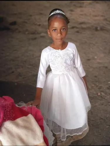 a  is dressed in her wedding dress,eritreans,ethiopian girl,eritrean,first communion,little girl in pink dress,sarafina,fulbe,communicant,little girl dresses,little princess,princesse,melanesians,hait