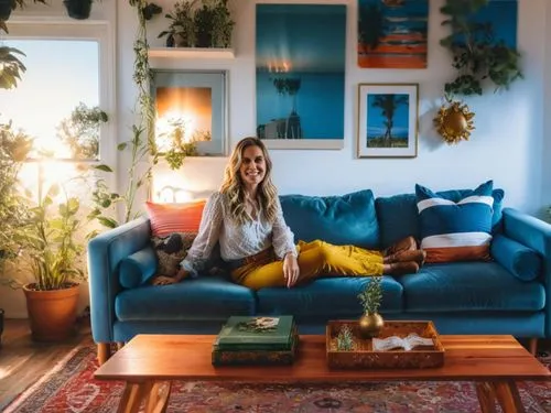 the living room of a photographer,blue room,living room,airbnb icon,apartment lounge,livingroom,scandinavian style,boho art,boho,shared apartment,modern decor,interiors,sitting room,decor,dandelion hall,interior decor,house plants,mid century sofa,interior design,mid century modern