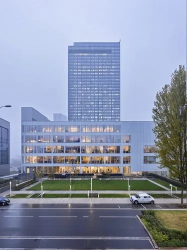 building, street view, rainy foggy weather,the view from a street of a large building,sloterdijk,skolkovo,undersecretariat,neukom,headquarter,newbuilding,Photography,General,Realistic