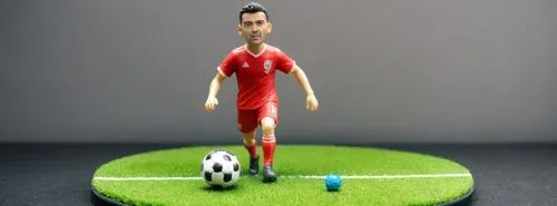 unique plastic toy  3d character soccer play, garage kits, in a stand, over a round base,3d figure,miniature figure,game figure,actionfigure,action figure,miniature figures,ronaldo,sports toy,figurine