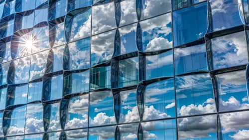 cloud shape frame,glass facade,glass facades,glass building,blue sky and clouds,cloud computing,cloud image,glass pane,blue sky clouds,cumulus clouds,glass panes,glass wall,cloudscape,cumulus,cumulus cloud,structural glass,blue sky and white clouds,fair weather clouds,towering cumulus clouds observed,cloud play