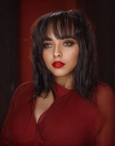 a portrait of a beautiful latina girl 23 years old black hair, red lips, wearing a red dress stand up in a balcony whit the golden Gate bridge in the night as background in 4k,digital painting,world d