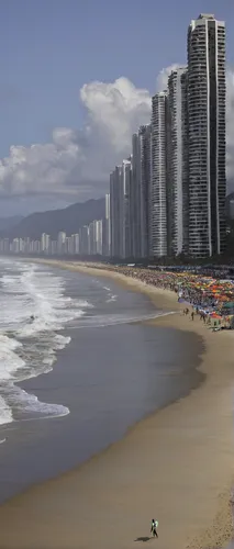 A surfer walks next to the shore at Barra da Tijuca beach before the start of the Billabong Rio Pro surfing championship in Rio de Janeiro, Brazil, Thursday, May 12, 2011. (AP Photo/Victor R. Caivano)