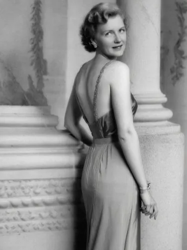 A lady from the 1940s in front of a classical column.,a vintage po shows the back of a woman's dress,claire trevor,hayworth,desilu,stabenow,greer garson-hollywood,greta garbo-hollywood,Photography,Bla