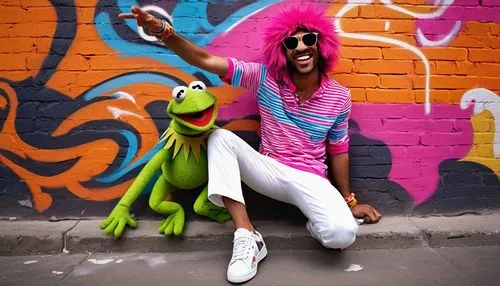 Funky muppet, sunglasses, bright pink fur, cool pose, relaxed arms, colorful striped shirt, white pants, sneakers, graffiti wall, urban street, sunny day, vibrant colors, playful atmosphere, low-angle