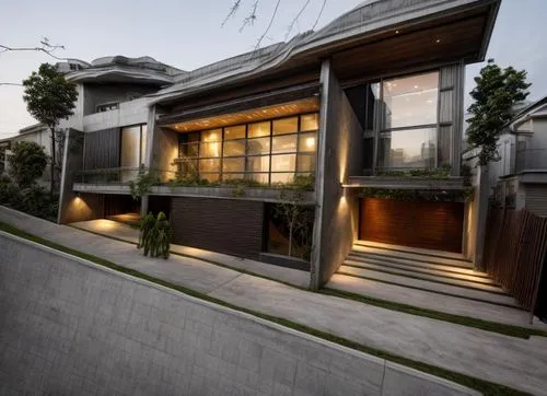 diseño exterior de una residencia estilo minimalista, con elementos de concreto, madera, cristal, rejilla de acero, vegetación, iluminación nocturna perfcetamente detallada, fotografia hiperrealista,a