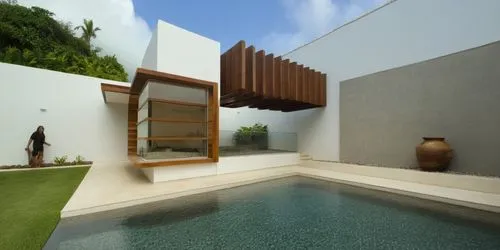 DISEÑO DE UNA PALAPA  ESTILO MINIMALISTA, CON PERGOLAS DE CONCRETO, ELEMENTOS PARA SOMBRE, LOSA DE CONCRETO CON CANAL DE ACERO, CANCELES DE ALUMINIO CON CRISTAL, MURO CASCADA CON ESPEJO DE AGUA,the po