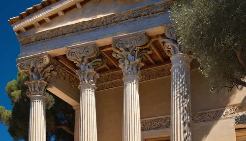 Ancient Greek architecture, Ionic columns, marble material, ornate carvings, spiral volutes, scroll-like decorations, towering height, majestic scale, detailed stonework, bright sunlight, warm ambient