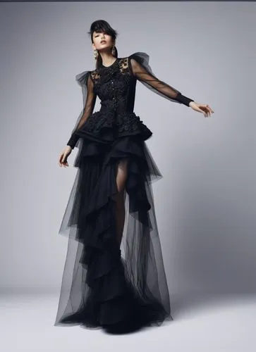 an asian woman in black is wearing a black dress with sheer mesh overlaying,dress walk black,siriano,a floor-length dress,roitfeld,gothic dress,kaliopi,Photography,Fashion Photography,Fashion Photogra