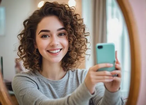 woman holding a smartphone,management of hair loss,makeup mirror,artificial hair integrations,cosmetic dentistry,cg,a girl's smile,girl with speech bubble,a girl with a camera,hair loss,mirror frame,photo shoot in the bathroom,natural cosmetic,curly hair,in the mirror,mobile camera,beautiful young woman,henna frame,women's cosmetics,mirror,Conceptual Art,Daily,Daily 34