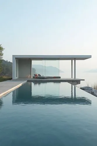 A sleek, minimalist villa situated on the edge of a calm lake, featuring a glass pavilion that opens onto a vast reflecting pool. The villa’s simple, geometric form is enhanced by its use of glass and