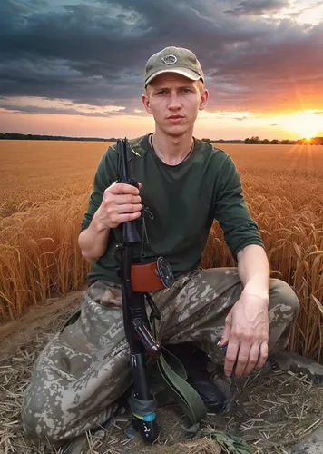 a man holding a sgun and gun in his right hand,berezniki,berezutskiy,ukraina,eastern ukraine,belarusian,azov,dmitrij,belarussian,belarusians,shcherbak,chernyshenko,ukraine,orazov,berezhnaya,survivorma