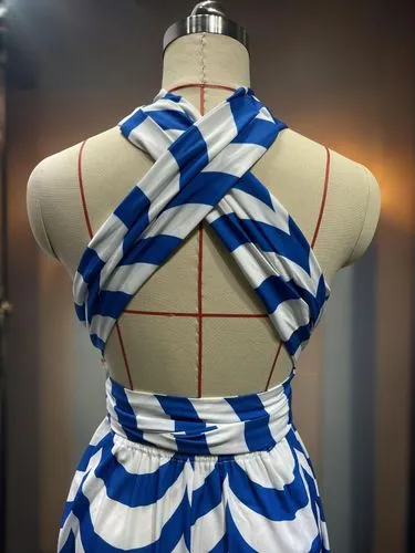 a mannequin is shown with blue and white  material,doll dress,traditional bow,artist's mannequin,japan pattern,japanese pattern,japanese patterns