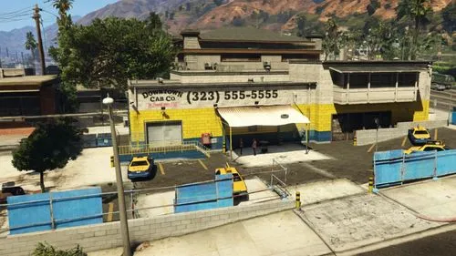 Expand knowing it's GTA V ambience.,the view of a small building from a roof,depots,auto repair shop,truckstop,freight depot,train depot,bus station,springwood,e-gas station,parking lot,truckmakers,im