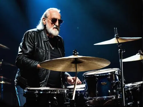 Fleetwood Mac's drummer, Mick Fleetwood, standing, mature man, (60yo), detailed wrinkles, gray hair, beard, sunglasses, black leather jacket, white shirt, blue jeans, boots, drumsticks in hand, playin