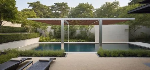 Keep materiality and aesthetics same as it is.,an outdoor pool sits next to a living room with lounge chairs and outdoor stonechips floor.,landscape design sydney,garden design sydney,landscape design