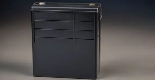 一个电池盒，表面有美工槽纹理，细节丰富,a black case with multiple compartments for storing items,lead storage battery,storage cabinet,computer case,cigarette box,metal cabinet,hohner,Photography,General,Realistic