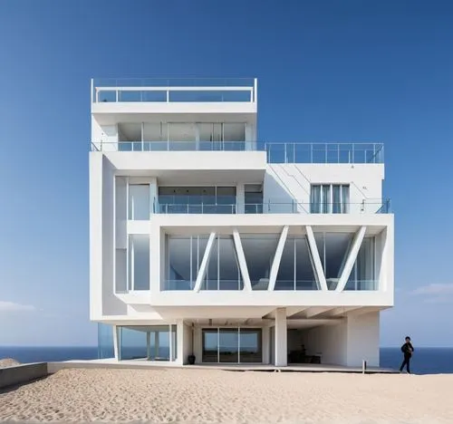 Fachada de edificio 4 pisos, estilo minimalista con volumen rectangular de vidrio saliente,a large white building sitting on top of a beach,dunes house,beach house,cubic house,beachhouse,malaparte,oce