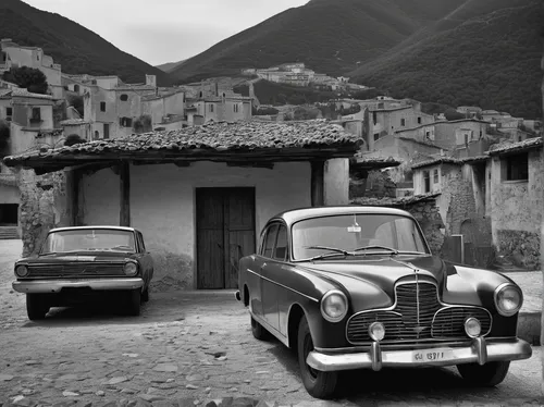 A monochrome photograph captures the essence of a forgotten era.,cinquecento,austin a30,fiat 600,aronde,austin a35,austin a40 farina,fiat 501,morris minor,fiat500,fiat 500,fiat 518,fiat cinquecento,mo