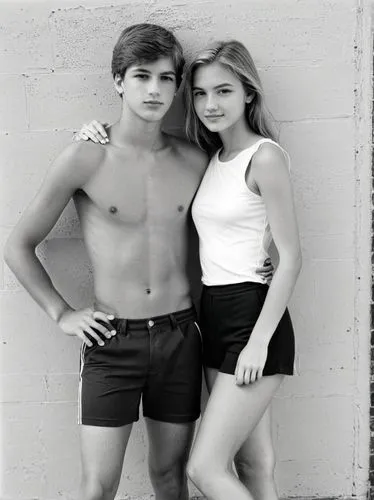 Black and white quality portrait of a pretty sophomore, high school with her boyfriend.,the young man is posing with his shirt off beside a young woman,vintage boy and girl,lucaya,meston,model years 1