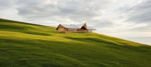 icelandic houses,rolling hills,home landscape,house in mountains,green landscape,house in the mountains,grass roof,romania,lonely house,hillside,thracian cliffs,green grass,dunes house,grasslands,landscape photography,summer house,meadow landscape,rügen island,roof landscape,grassland,Architecture,General,Masterpiece,Humanitarian Modernism