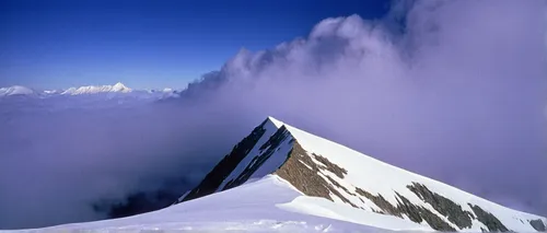 Part of the summit ridge, seen through breaking cloud from just below the Langma LaNikon F5, 180mm, Fuji Velvia 100,breithorn,mont blanc,aiguille du midi,top mount horn,koryaksky volcano,mitre peak,mo