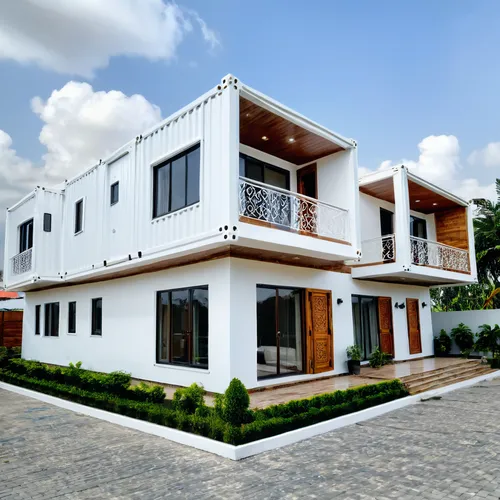 Design of a luxurious container 4-bedroom duplex home with an exquisite fusion of old and new, where elegance supersedes. adding the white hues of natural light in well-placed large windows. with the 