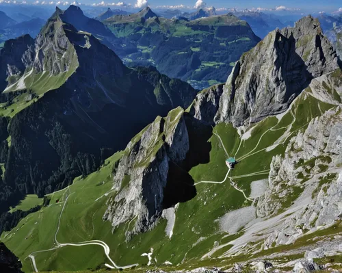 Weaving through limestone outcroppings, we hiked the stunning Lisengrat, a sinuous chain-protected trail from Rotsteinpass to the summit of Säntis. The Lisengrat is a magnificent ridge route between S