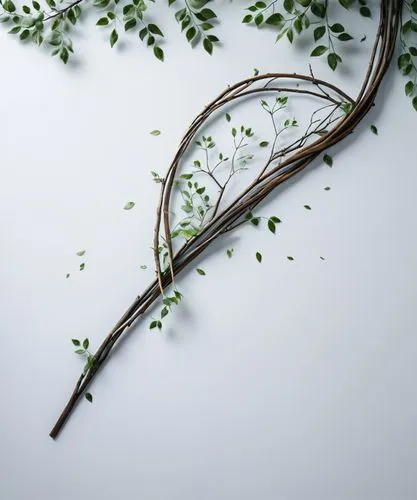 A made of metal sheet with branches against a white background ,some white flowers are placed next to leaves,snowflake background,white floral background,christmas snowy background,birch tree backgrou