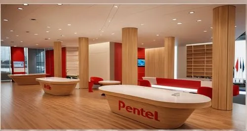 This is a product stand from the art fancy brand 'Pentel.' Products are displayed on the stand with Fentel's logo on it. Each pillar is surrounded by a chair, the seats are cushioned, and the walls ar