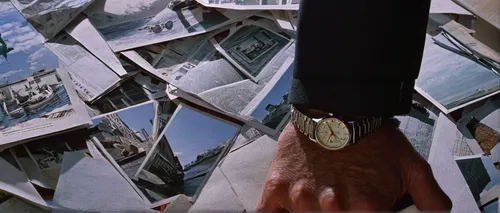 Write a suspenseful story featuring a Torgoen watch as a crucial clue.,counting frame,spy-glass,holding a frame,baron munchausen,magneto-optical disk,vertigo,film frames,love lock,watch dealers,clock 