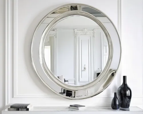 Compose a poem about the beauty and allure of a silver-framed mirror.,exterior mirror,makeup mirror,mirror frame,the mirror,wood mirror,parabolic mirror,dressing table,magic mirror,door mirror,art dec