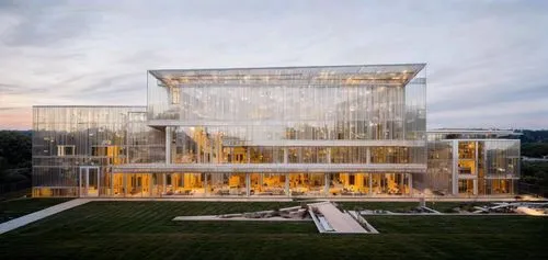 Modern building, at dusk,glass facade,snohetta,glass building,jmu,glass facades,ualbany,umbc,structural glass,music conservatory,chancellery,glass wall,safdie,gensler,modern architecture,mckeldin,cube