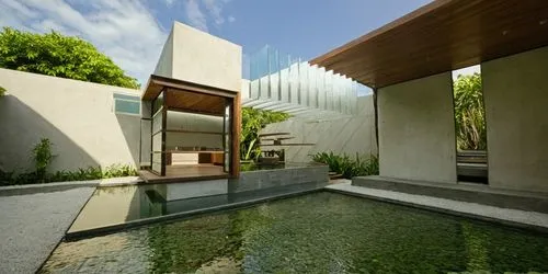 DISEÑO DE UNA PALAPA  ESTILO MINIMALISTA, CON PERGOLAS DE CONCRETO, ELEMENTOS PARA SOMBRE, LOSA DE CONCRETO CON CANAL DE ACERO, CANCELES DE ALUMINIO CON CRISTAL, MURO CASCADA CON ESPEJO DE AGUA,an out