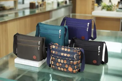 some colorful bags are stacked on top of each other,carryall,pocketbooks,satchels,purses,bookbags,smythson,schoolbags,crossbody,leather goods,eastpak,pocketbook,handbags,doctor bags,women's accessorie