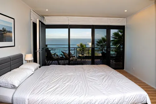 make it more a luxury suite airbnb bedroom,window with sea view,sleeping room,guest room,ocean view,guestroom,room divider,great room,modern room,bedroom window,las olas suites,hotelroom,contemporary 