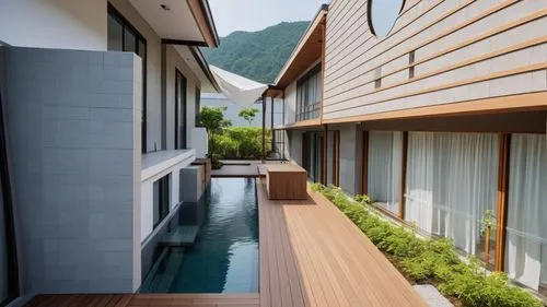 a minimalist architecture style and sense of muji. no chang position os scene,a narrow pool is in between two buildings with windows,wooden decking,ryokan,corten steel,tungsha,roof tile,amanresorts,Ph