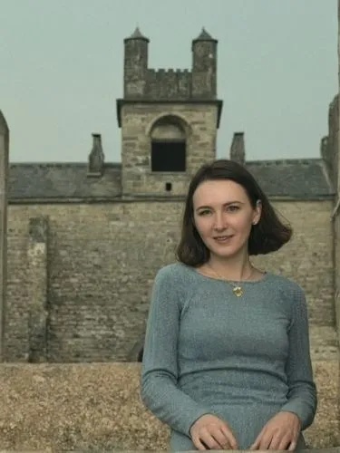 man and woman posing in front of an ancient building,a woman is sitting in front of a castle,iulia hasdeu castle,girl in a historic way,laoghaire,nuig,kilmacduagh,pevensie,Photography,Black and white 